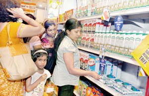 While the Consumer Affairs Authority insists that milk powder is a non-essential item, these desperate mothers rushed to a supermarket yesterday on a report that milk powder was available, but they were disappointed when they found no milk powder. Pic by Indika Handuwela