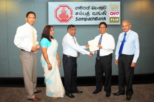 Picture shows Tuli Cooray, JAAF Secretary General exchanging documents with Aravinda Perera, Managing Director - Sampath Bank. Also in the picture are Jumar Preena CEO of CH17, Ms. Yasmin Rohana Juhari, Chairperson of Channel  17 and Ranjith Samaranayake, Group Chief Financial Officer of Sampath Bank
