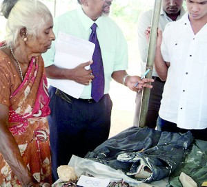 A woman looks for clues of a loved one who died on the  ill-fated Lion Air