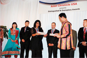 Thahani receiving her award