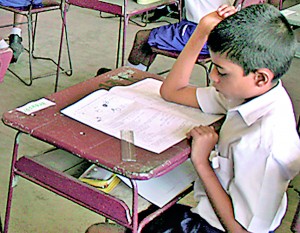 A student sitting for the grade 5 exam. File pic