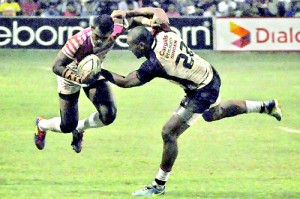 Action from the flood-lit match played at Havelock Park - Pic by Ranjith Perera