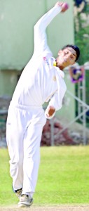 Royal College allrounder Randev Pathirana took four wickets and returned to hit 61 against Ananda College.  - Pix by Ranjith Perera