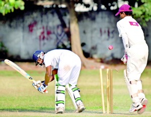 Wesley batsman Reshan Seneviratne, who made 49, is beaten and bowled by Kingswood’s Damith Weerakoon as wicketkeeper Ruwan Hathurusingha reacts