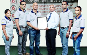 Picture from left shows - Dilki Chandrawansa - Environmental Executive, Amila Jayakody - Asst. HR/Compliance Manager, Rashid Hameen - Director, Thermo Plastics receiving the Certificate from B.A. Sumanasiri - Manager, Systems and Service Certification of SGS Lanka, Praneeth Wijesinghe - Asst. GM, Finance and Administration and Dharma Bandula -Asst. GM, Production and Logistics.