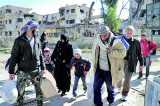 Fighting as aid due to enter besieged Homs in Syria