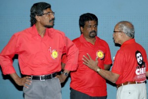 Peaceful transition: The JVP’s leadership change from Somawansa Amarasinghe (R) to Anura Kumara Dissanayke (C) sends a powerful message to other parties. Also in the picture is JVP General Secretary Tilvyn Silva