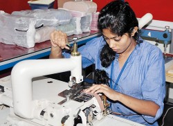 She sews shoes at shoe show