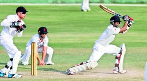 Sri Lanka ‘A’ top scorer Madawa Warnapura drives against England Lions at Pallekelle yesterday. - Pic Shantha Ratnayake