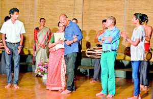 To Vajira with love: Arun Abeyagunawardena makes a donation to the CV Dance Company watched by family members