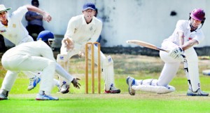 Cambrian batsman Gayan Kumara who top scored for his team neatly guides the ball towards the leg-side as Royal fielders quickly respond in their match played at Reid Avenue  - Pic by Ranjith Perera