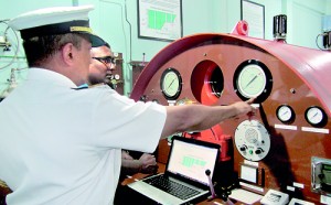 Under the watch of Navy doctors, Navy divers undergoing  treatment inside Recompression Chamber