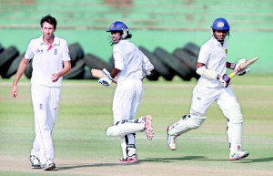 Openers Upul Tharanga and Dimuth Karunaratne transferred the frustration on to England Lions with a stand of 228 runs on the final day at Dambulla - Pic by Shantha Ratnayaka