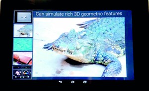 Virtual reality touchscreen: Japanese firm Fujitsu has developed a prototype tablet device that uses ultrasound vibrations to mimic a variety of textures, such an alligator's skin (pictured)