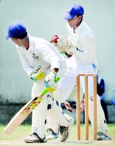 DSS batsman Akil Imran is caught by Dharmaraja wicketkeeper Kavinda Ratnayake off  Dinesh Lanka. Pix by Ranjith Perera