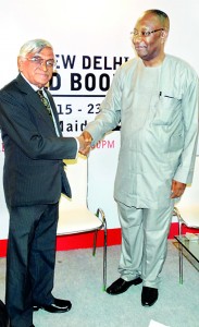 Vijitha Yapa,  new Chairman of the Afro Asian Book Council being congratulated by the former Chairman Dayo Alabi who is the Chairman of The Book Company Ltd of Lagos, Nigeria.