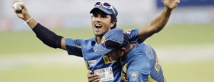 Sri Lanka's Dinesh Chandimal celebrates after taking a catch to dismiss Pakistan's Sohaib Maqsood during their second Twenty20 international cricket match in Dubai