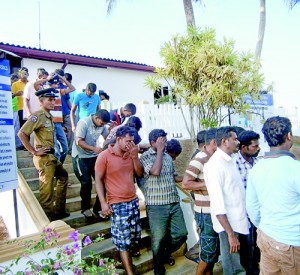 A boat-load of illegal immigarnts to New Zealand apprehended last month in Beruwala. Pic by Sarath Siriwardhena