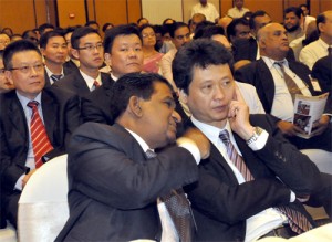 Seen here is Ananda Goonatilleka, President of Sri Lanka China Friendship Association in conversation with Tan Wenhui, Deputy Director - General of Zhongshan Foreign and Overseas Chinese Affairs Bureau of China. Pic by Susantha Liyanawatte.