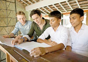 Rob and Paul Forkan with youngsters in Sri Lanka. Pix courtesy Lee Thomson and Annie Oswald