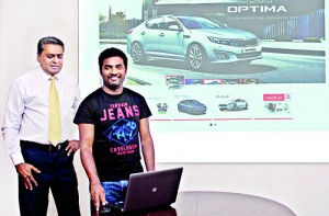 Picture shows Kia Motors (Lanka) Managing Director Mahen Thambiah with Cricket icon Muttiah Muralitharan at the launch of the new website.