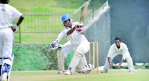 Sylvestrian batsman Hansamal Perera drives on his way to score an unbeaten 94 against Vidyartha  at Pallekele - Pic by Ranjith Perera