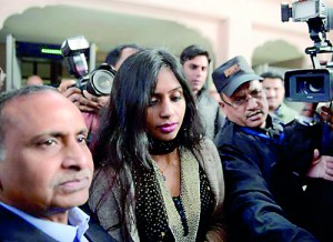 Indian diplomat Devyani Khobragade (C) with her father Uttam Khobragade (L) (Reuters)