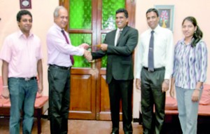 (Left to Right) Dr. Rasika Dayarathne, Lecturer, UCSC; Dr. W.K. Hirimburegama, Vice Chancellor, University of Colombo; Vijit Coomara, Chief Technology Officer, B Sharp; Dilan Rajapakse, General Manager, B Sharp; Rukshila Fernandopulle, Administrative Executive, B Sharp