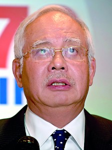 Prime Minister Najib Razak addresses the media at a hotel near Kuala Lumpur International Airport yesterday.