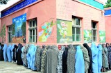 Afghans hail peaceful election; high turnout