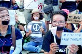 Opposition to Thai coup simmers