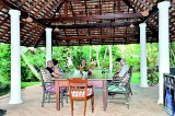 Lankan delicacies and English tea amidst paddy fields