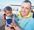 Jihadists murder Briton, battle for Kurdish town