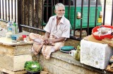 Displaced Slave Island resident sells betel in Kataragama