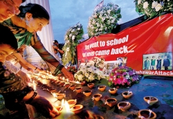 Candlelight vigil for Peshawar victims