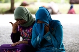 Candles, prayers and tears as Asia mourns tsunami dead 10 years on