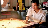 Youngsters struggle against experienced carrom players