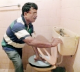Trincomalee teacher creates wonderful  invention that could protect the planet’s scarce water resources – thro’ commode power!