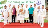 Singer bags Over-40 title Singer bags Over-40 title