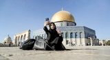 Palestinians connect to Jerusalem’s Muslim holy sites with selfies
