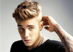 Justin Bieber fights his way to the top