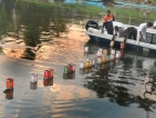 Floating lanterns: Tsunami memorial at sea