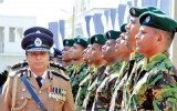 Pujith Jayasundara inspects a guard of honour