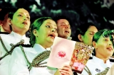 Police sing for the thrice-blessed day of Vesak