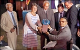 Dr. Ajith Perera receives UNASL APEX award