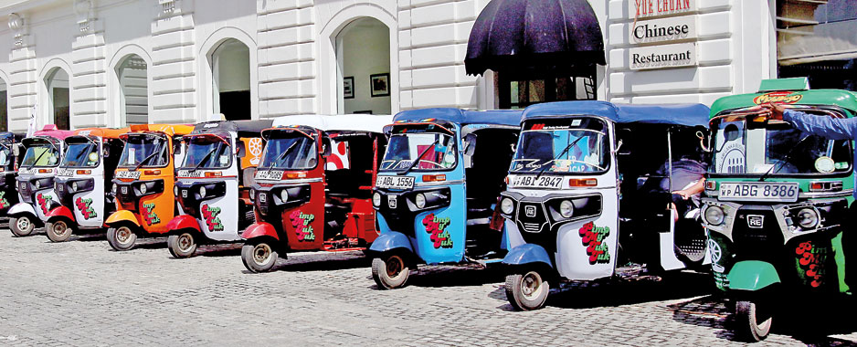 Reaching out  to those in need  in a tuk-tuk