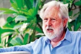 Make climate change your cause, Lord Puttnam tells younger generation