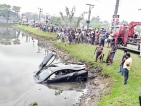 BMW said to be driven by Minister’s son hits two cars before plunging into canal