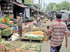 Avurudu vendors yell for customers but shoppers walk on