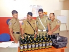 Airport police nab woman attempting to smuggle in 24 bottles of liquor
